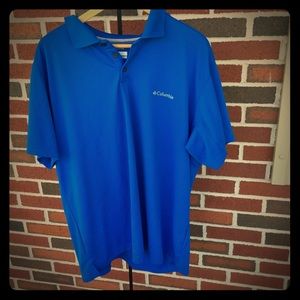 Men’s Columbia collared shirt. It is dark blue.